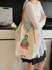 Chic beige knitted tote bag with colorful girl embroidery and brown leather straps