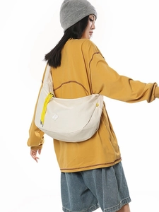 Minimalist beige plaid large capacity dumpling crossbody bag with yellow zipper detail