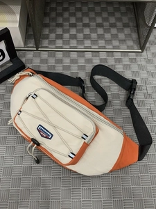 Orange and beige large capacity nylon chest bag with drawstring and adjustable strap
