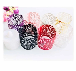 Laser-cut hollow vine paper wraps for LED tea lights in multiple vibrant colors