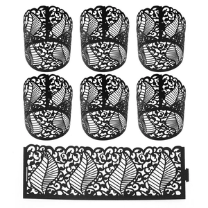 Set of 6 black hollow laser-cut cupcake wrappers with elegant leaf and vine patterns