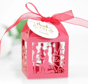 Detailed laser-cut wedding gift box with Mr & Mrs silhouette and gold thank you tag