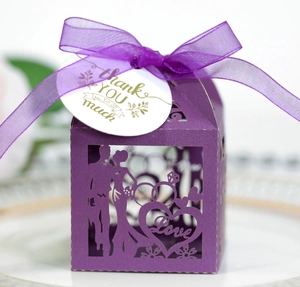 Detailed laser-cut purple wedding favor box with heart and Thank You tag decor