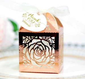 Rose gold laser-cut rose gift box with white ribbon and Thank You tag for wedding favors