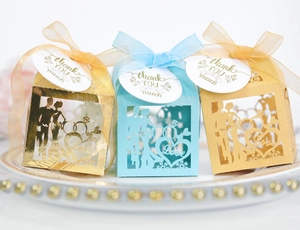 Detailed laser-cut wedding favor boxes with bride silhouette and thank you tag