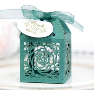 Elegant dark green laser-cut rose gift box with silk ribbon and thank you tag for weddings