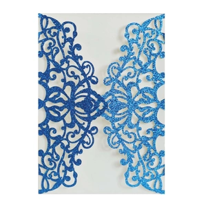 Elegant laser-cut blue glitter wedding invitation cover with floral pattern and sparkles