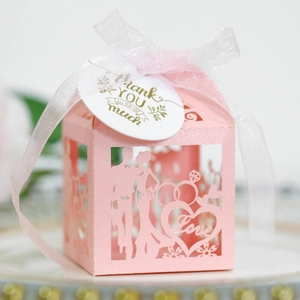 Pink laser-cut wedding favor box with Love heart design and Thank You hanging tag