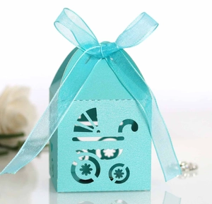 Detailed laser-cut baby carriage candy box in light blue with elegant ribbon handle