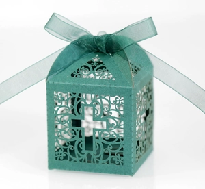 Detailed close-up of dark green laser-cut wedding candy box with elegant cross pattern