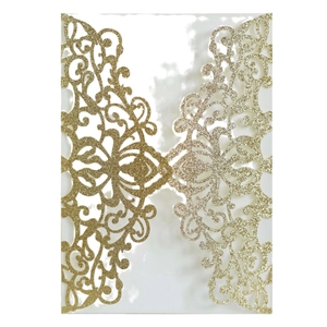 Golden glitter laser-cut wedding invitation cover with elegant symmetric floral patterns