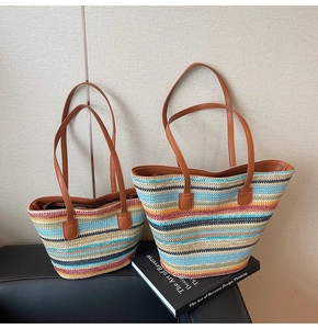 Comparison of large and medium sizes for colorful woven straw tote bags with leather handles