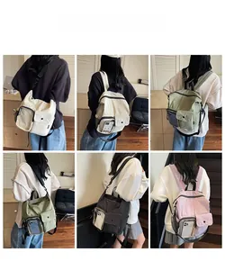 Detail showing multi-functional canvas travel bag in four colors with clear phone pocket