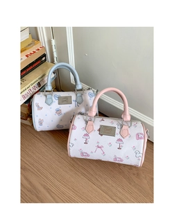 Detail of Boston bags featuring pastel animal prints and textured synthetic leather