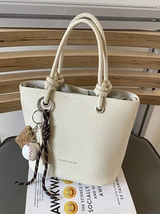 Women Fashion PU Leather Bucket Bag Minimalist Litchi Texture Shoulder Crossbody Bag With Baseball Charm Knotted Handle Tote