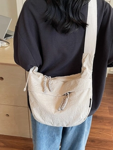 Fashionable ivory large capacity dumpling crossbody bag with pleated texture and wide strap