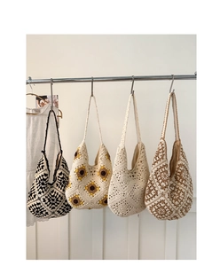 Detailed close-up showing four different handmade crochet tote bags with floral patterns