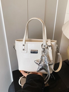 Chic off-white crocodile pattern crossbody bag with silver star charm and metal logo