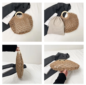 Detailed view of handmade woven straw tote bag with round wood handles and inner pouch