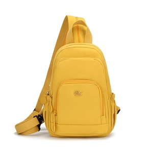 Front view of bright yellow nylon crossbody bag with multi-zipper pockets and MS logo
