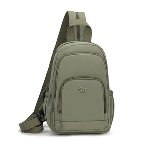 Detail view of military green nylon crossbody bag with multi-zipper layers and side pocket