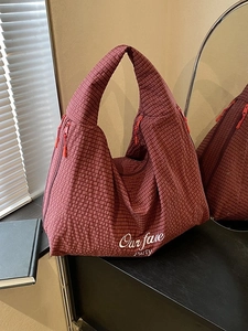 Retro oversized tote bag with red-brown checkered pattern and multiple orange zippers