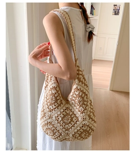 Detailed texture of bohemian crochet tote bag with retro geometric granny square patterns