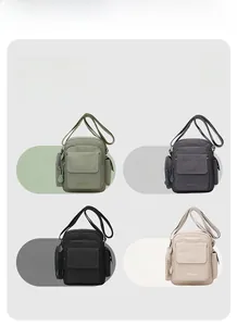 Comparison of nylon crossbody bags in four colors: green, grey, black, and off-white