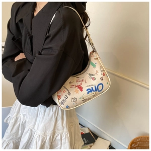Detail of the colorful graffiti hobo bag with artistic hand-drawn patterns and zipper