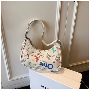Detail of off-white graffiti hobo bag with colorful sketches and polished metal plate