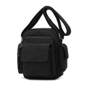 Detailed view of black nylon crossbody bag with multi-pockets and adjustable strap