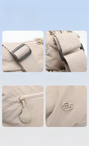 Close-up of adjustable strap, smooth zipper, and metallic logo on the nylon tote bag