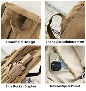 Detail view of khaki nylon backpack showing sturdy handle, side pocket and inner pocket