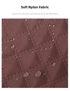 Macro detail of soft nylon fabric with quilted rhombic pattern and waterproof water droplets