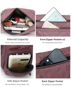 Detailed view of the purple quilted nylon crossbody bag showing multiple storage compartments