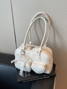 White vintage PU leather Boston bag with heart-shaped pocket and pearl bow pendant