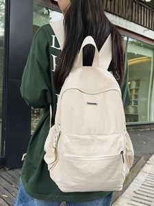 Minimalist off-white canvas backpack for men with large capacity and casual summer style