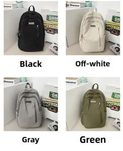 Four minimalist nylon backpacks in black, off-white, grey, and green shown in a grid