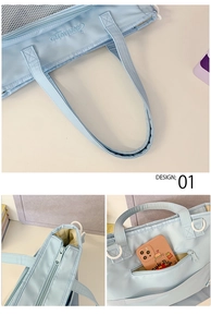 Detail of light blue nylon tote bag showing multiple functional zipper pockets and D-rings