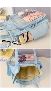 Detail of light blue ita bag showing side umbrella pocket and spacious interior storage