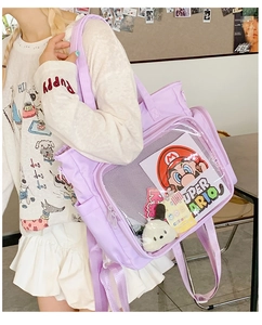Detail of the lavender ita bag with large transparent PVC window for doll display