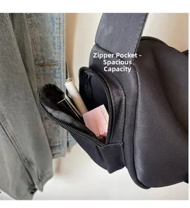 Dettaglio della tasca laterale con zip della borsa Oxford con spazio per piccoli cosmetici