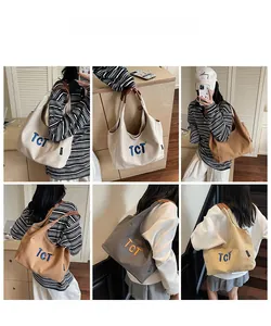 Multiple views of large canvas tote bag with TCT embroidery in four neutral colors