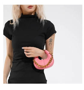 Pink crescent handbag with lychee pattern leather and chunky gold chain strap detail
