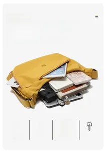 Detailed interior of ginger canvas bag showing capacity for iPad and daily essentials