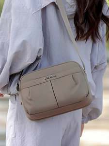 Chic khaki small crossbody bag for women with multiple zipper pockets and adjustable strap