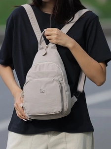 Light apricot nylon backpack for women with multi-pocket design for travel and sports
