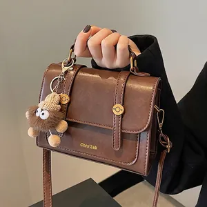 Vintage Women PU Leather Handbag Retro Small Square Shoulder Crossbody Bag With Plush Monster Charm Elegant Commuter Bag