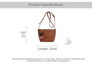 Brown leather tote bag dimensions 23cm x 13cm with cherry pendant and adjustable strap