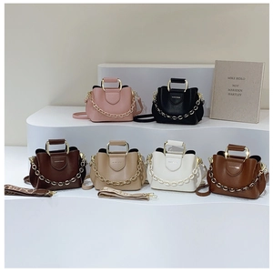Detailed collection of minimalist crossbody bucket bags in six neutral color options